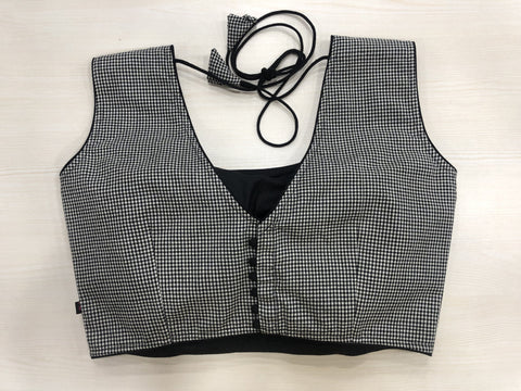 Small checked sleeveless blouse