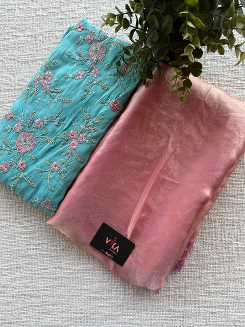 Emb silk blouse with shiny tissue organza saree