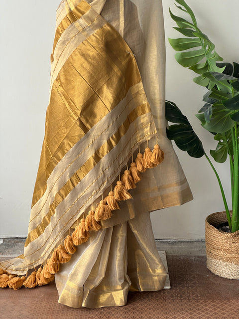 Golden tissue saree with blouse