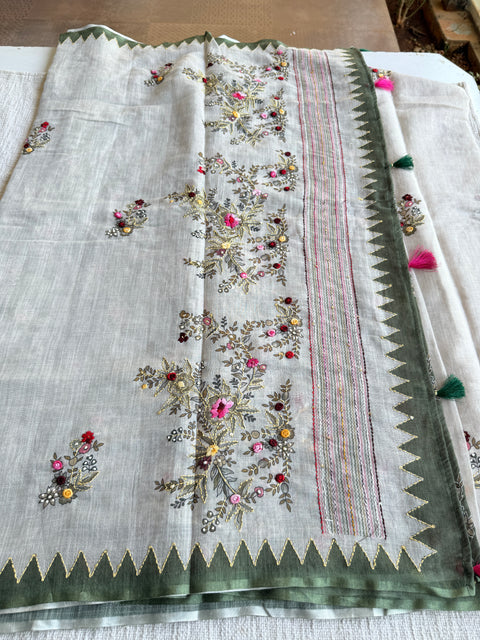 Hand emb Linen saree with printed blouse