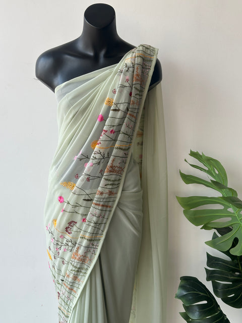 Pista green garden emb georgette saree